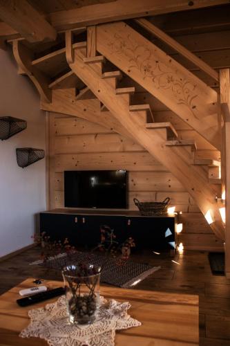 Közös társalgó / TV, Domki Góralskie Tatrzański Zakątek (Domki Goralskie Tatrzanski Zakatek) in Bustryk Közös társalgó / TV, Domki Góralskie Tatrzański Zakątek (Domki Goralskie Tatrzanski Zakatek) in Bustryk