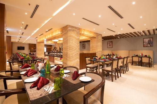 Restaurant, Bhagini Icon Premier Hotel in Marathahalli Restaurant, Bhagini Icon Premier Hotel in Marathahalli