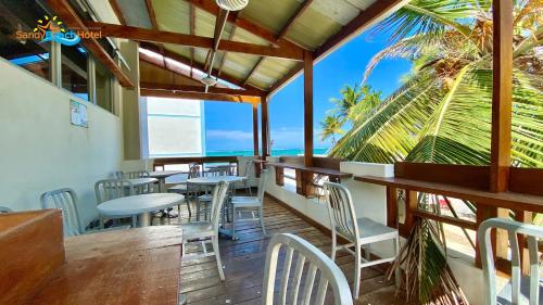 Restaurant, Sandy Beach Hotel in San Juan gebied Restaurant, Sandy Beach Hotel in San Juan gebied