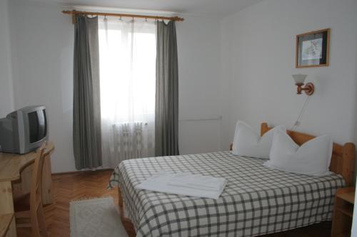 Habitación, Hotel Merkur in Miercurea-Ciuc Habitación, Hotel Merkur in Miercurea-Ciuc