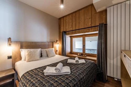 Residence Hameau de Clotaire Alpe d'Huez - by EMERALD STAY