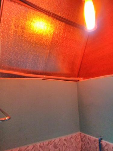 Bathroom, บ้านพักกลางนา in Sawang Daen Din Bathroom, บ้านพักกลางนา in Sawang Daen Din