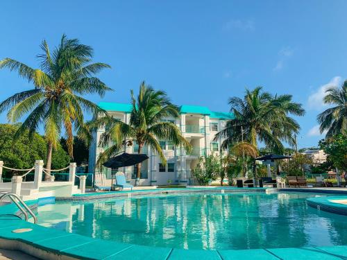 Piscina, Best Western Grand Baymen Gardens in San Pedro Piscina, Best Western Grand Baymen Gardens in San Pedro