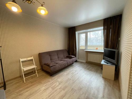 Shared lounge/TV area, Apartment at 23 Robespierre Street in Krasnoyarsk Shared lounge/TV area, Apartment at 23 Robespierre Street in Krasnoyarsk
