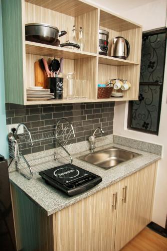 Kitchen, Marilao Staycation at Lauren's Crib FREE PARKING in Valenzuela Kitchen, Marilao Staycation at Lauren's Crib FREE PARKING in Valenzuela