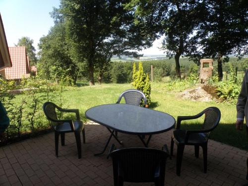 Balcony/terrace, Stylish detached villa on a country estate with a pool in Brandscheid Balcony/terrace, Stylish detached villa on a country estate with a pool in Brandscheid