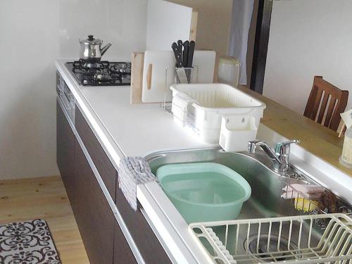 Kitchen, Guest House Miyakojima in Yonaha Beach Kitchen, Guest House Miyakojima in Yonaha Beach