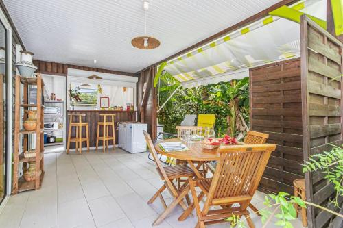 Terraza/balcón, Bungalow charmant a Riviere-Salee avec terrasse privee in Riviere-Salee Terraza/balcón, Bungalow charmant a Riviere-Salee avec terrasse privee in Riviere-Salee