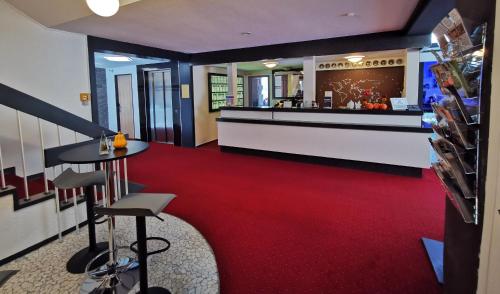 Vestíbulo, Hotel Grille in Erlangen Vestíbulo, Hotel Grille in Erlangen