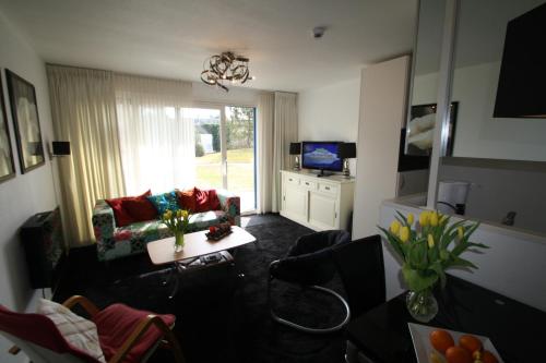 Comfort-Appartement ZEEDUIN, op Beg grond met Terras - Resort Amelander Kaap met Gratis Hotel-ZWEMBA in Ameland Comfort-Appartement ZEEDUIN, op Beg grond met Terras - Resort Amelander Kaap met Gratis Hotel-ZWEMBA in Ameland