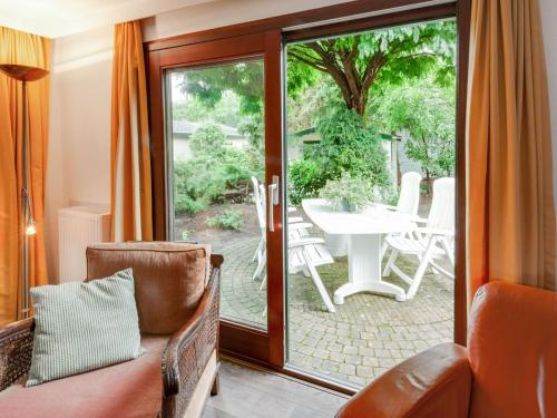 Balcony/terrace, Tasteful chalet near Ommen for family in Ommen Balcony/terrace, Tasteful chalet near Ommen for family in Ommen