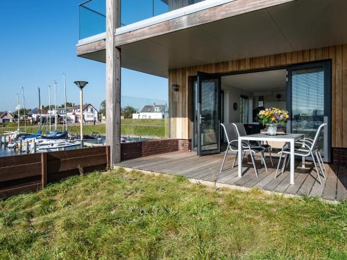 Balcony/terrace, Tasteful apartment with marina view in Kamperland Balcony/terrace, Tasteful apartment with marina view in Kamperland