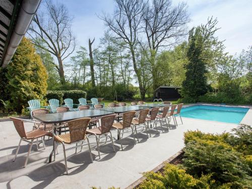 Balcony/terrace, Magnificent Farmhouse in Sint Joost with Private Pool in Sint Joost Balcony/terrace, Magnificent Farmhouse in Sint Joost with Private Pool in Sint Joost