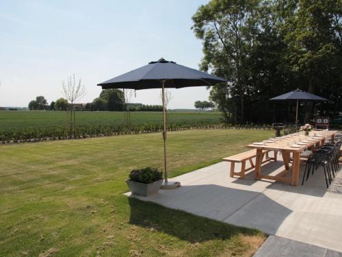 Balcony/terrace, Elegant Farmhouse in Zuidzande with Private Garden in Zuidzande Balcony/terrace, Elegant Farmhouse in Zuidzande with Private Garden in Zuidzande