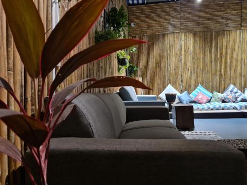 Shared lounge/TV area, HOSHTEL99 - PRIME - Stay, Cowork and Cafe near Osho Teerth Park Shared lounge/TV area, HOSHTEL99 - PRIME - Stay, Cowork and Cafe near Osho Teerth Park
