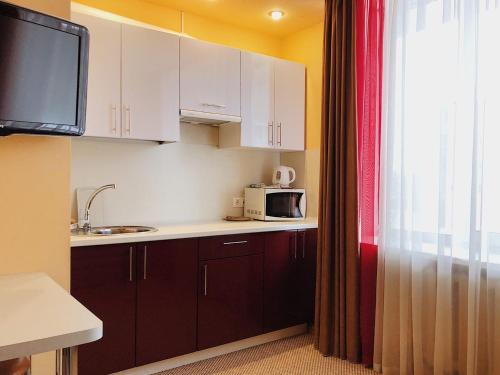 Kitchen, Italmas Hotel in Leninskiy Kitchen, Italmas Hotel in Leninskiy
