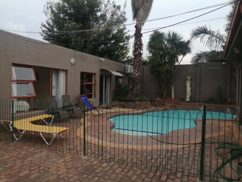 Swimming pool, Naisar's Apartments Primrose,Johannesburg in Johannesburg City Centre Swimming pool, Naisar's Apartments Primrose,Johannesburg in Johannesburg City Centre
