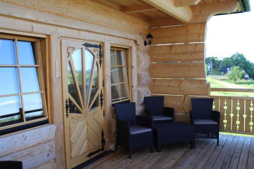 Erkély/terasz, Domki Góralskie Tatrzański Zakątek (Domki Goralskie Tatrzanski Zakatek) in Bustryk Erkély/terasz, Domki Góralskie Tatrzański Zakątek (Domki Goralskie Tatrzanski Zakatek) in Bustryk