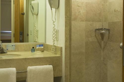 This photo about One Queretaro Plaza Galerias shared on HyHotel.com