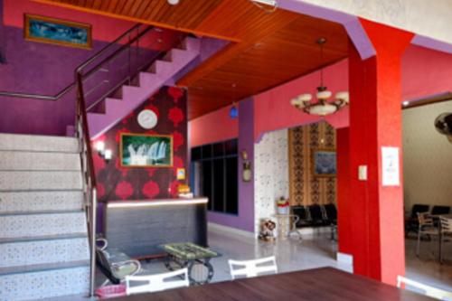 Lobby, Hotel Rosichan Bau Bau Mitra RedDoorz in Baubau Lobby, Hotel Rosichan Bau Bau Mitra RedDoorz in Baubau