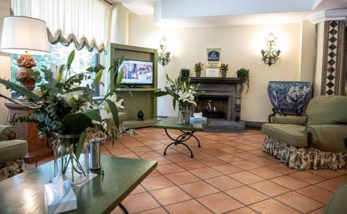 Közös társalgó / TV, Best Western Park Hotel Roma Nord in Fiano Romano Közös társalgó / TV, Best Western Park Hotel Roma Nord in Fiano Romano