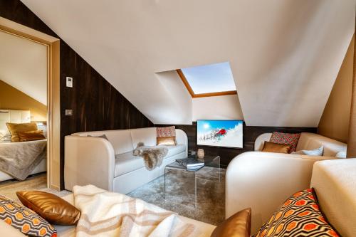 Shared lounge/TV area, Hotel Le Tremplin in Meribel Shared lounge/TV area, Hotel Le Tremplin in Meribel