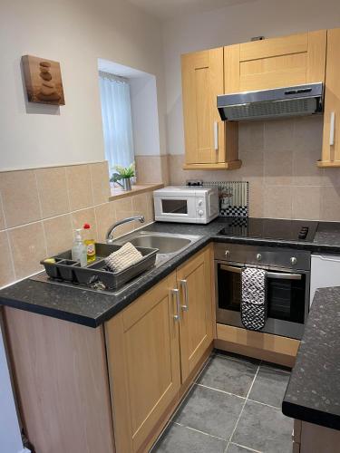 Kitchen, No 7 - 1 BED NEAR SEFTON PARK AND LARK LANE in Garston Kitchen, No 7 - 1 BED NEAR SEFTON PARK AND LARK LANE in Garston