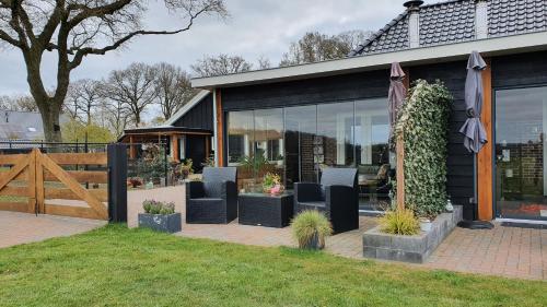ogród, B&B Hertenhoef, Fluitenberg (Hoogeveen) in Fluitenberg ogród, B&B Hertenhoef, Fluitenberg (Hoogeveen) in Fluitenberg