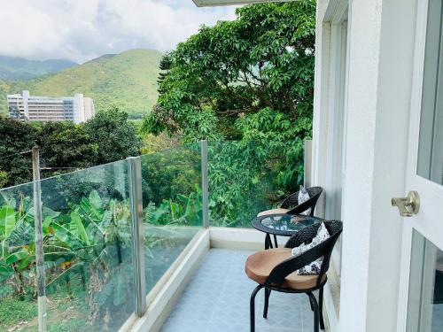 Balcony/terrace, City Oasis Guesthouse in Lantau Island Balcony/terrace, City Oasis Guesthouse in Lantau Island