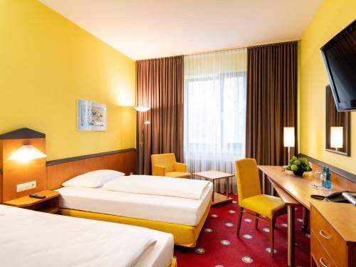 Plaza Hotel & Living Frankfurt - main image
