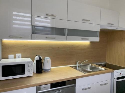 ห้องครัว, Apartmán Frymburk 30 (Apartman Frymburk 30) in ฟริมบูร์ก ห้องครัว, Apartmán Frymburk 30 (Apartman Frymburk 30) in ฟริมบูร์ก