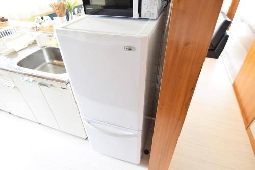 Kitchen, Sasatsuka Fleur Tachibana Hotel Apartment near Shimokitazawa Kitchen, Sasatsuka Fleur Tachibana Hotel Apartment near Shimokitazawa