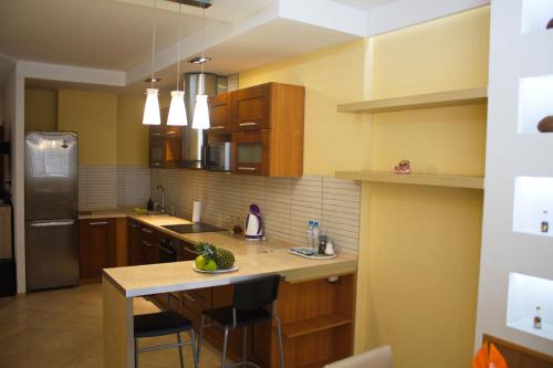 Kitchen, PaulMarie Apartments on Prs. Stroiteley in Vitebsk Kitchen, PaulMarie Apartments on Prs. Stroiteley in Vitebsk