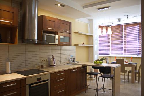 Kitchen, PaulMarie Apartments on Prs. Stroiteley in Vitebsk Kitchen, PaulMarie Apartments on Prs. Stroiteley in Vitebsk