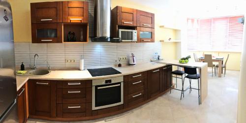 Kitchen, PaulMarie Apartments on Prs. Stroiteley in Vitebsk Kitchen, PaulMarie Apartments on Prs. Stroiteley in Vitebsk