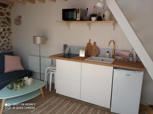 keuken, Charmant logement T2 à 2 pas de la mer (Charmant logement T2 a 2 pas de la mer) in Granville keuken, Charmant logement T2 à 2 pas de la mer (Charmant logement T2 a 2 pas de la mer) in Granville