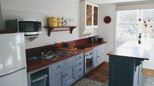 Kitchen, The Gardener's Cottage on Warrentinna in Prospect Vale Kitchen, The Gardener's Cottage on Warrentinna in Prospect Vale