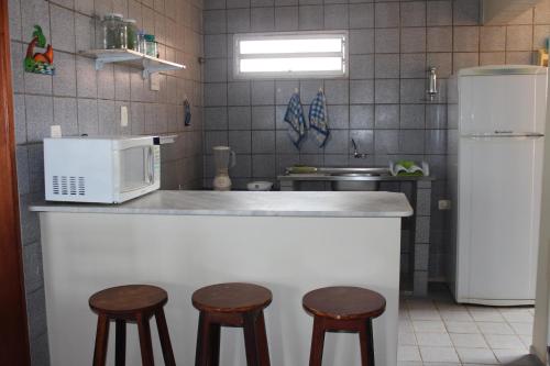 Kitchen, Apartamento de frente para o Mar em Luis Correia in Luis Correia Kitchen, Apartamento de frente para o Mar em Luis Correia in Luis Correia