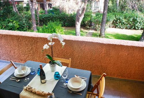 Balcony/terrace, Beach House Calaverde Village in Santa Margherita di Pula Balcony/terrace, Beach House Calaverde Village in Santa Margherita di Pula