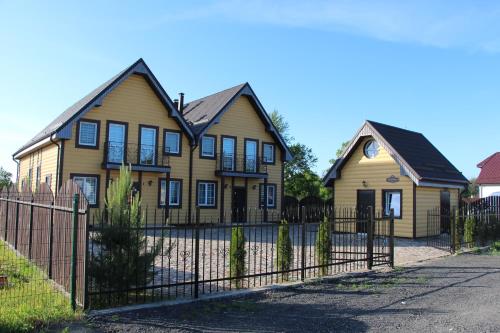 Udvendig, Коттедж у озера in Yantarny Udvendig, Коттедж у озера in Yantarny