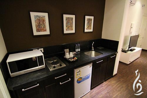 Kitchen, Rafa Homes Apartment near Arab Open University Kitchen, Rafa Homes Apartment near Arab Open University