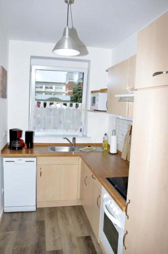 Kitchen, Ferienwohnung am Wasserturm in Zwenkau Kitchen, Ferienwohnung am Wasserturm in Zwenkau