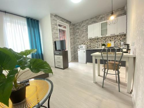 Kitchen, Уютные студии in Izhevsk Kitchen, Уютные студии in Izhevsk