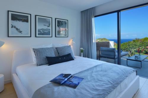 Rêve de Saint Barth - Vue Mer - Piscine Chauffée & Jacuzzi (Reve de Saint Barth - Vue Mer - Piscine Chauffee & Jacuzzi) in グスタビア Rêve de Saint Barth - Vue Mer - Piscine Chauffée & Jacuzzi (Reve de Saint Barth - Vue Mer - Piscine Chauffee & Jacuzzi) in グスタビア