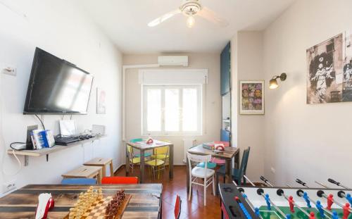 Shared lounge/TV area, Hostel of the Sun in Naples Shared lounge/TV area, Hostel of the Sun in Naples