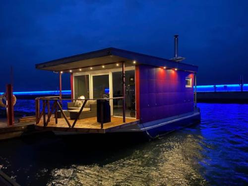 Balcony/terrace, Cozy Floating house with sauna near Estonian Open Air Museum Balcony/terrace, Cozy Floating house with sauna near Estonian Open Air Museum