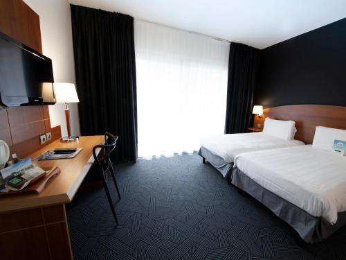 صالة مشتركة/ منطقة التلفزيون, كيرياد كليرمونت فيراند سينتر (Kyriad Clermont Ferrand Centre) in Clermont-Ferrand City Center صالة مشتركة/ منطقة التلفزيون, كيرياد كليرمونت فيراند سينتر (Kyriad Clermont Ferrand Centre) in Clermont-Ferrand City Center