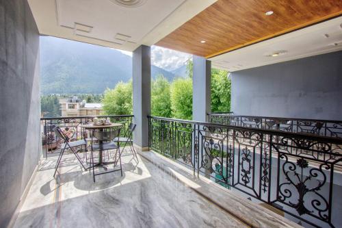 Balcony/terrace, Hotel Woodstock Inn in Aleo Balcony/terrace, Hotel Woodstock Inn in Aleo