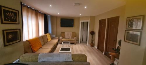 Közös társalgó / TV, La casa de la abuela in Ferrol Közös társalgó / TV, La casa de la abuela in Ferrol