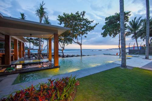 Swimming pool, Candi Beach Resort and Spa in Candidasa Swimming pool, Candi Beach Resort and Spa in Candidasa